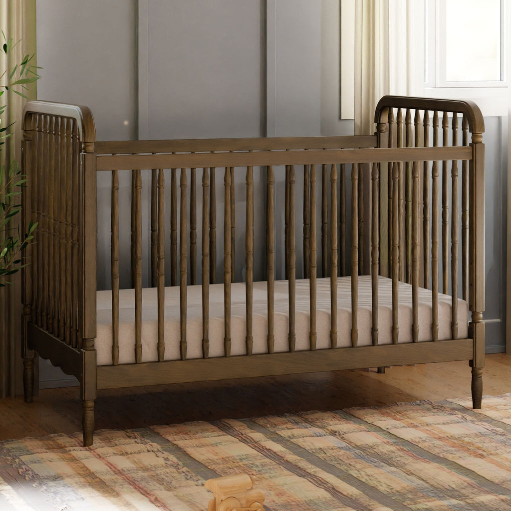 Liberty 3-in-1 Convertible Spindle Crib with Toddler Bed Conversion Kit | Natural Walnut