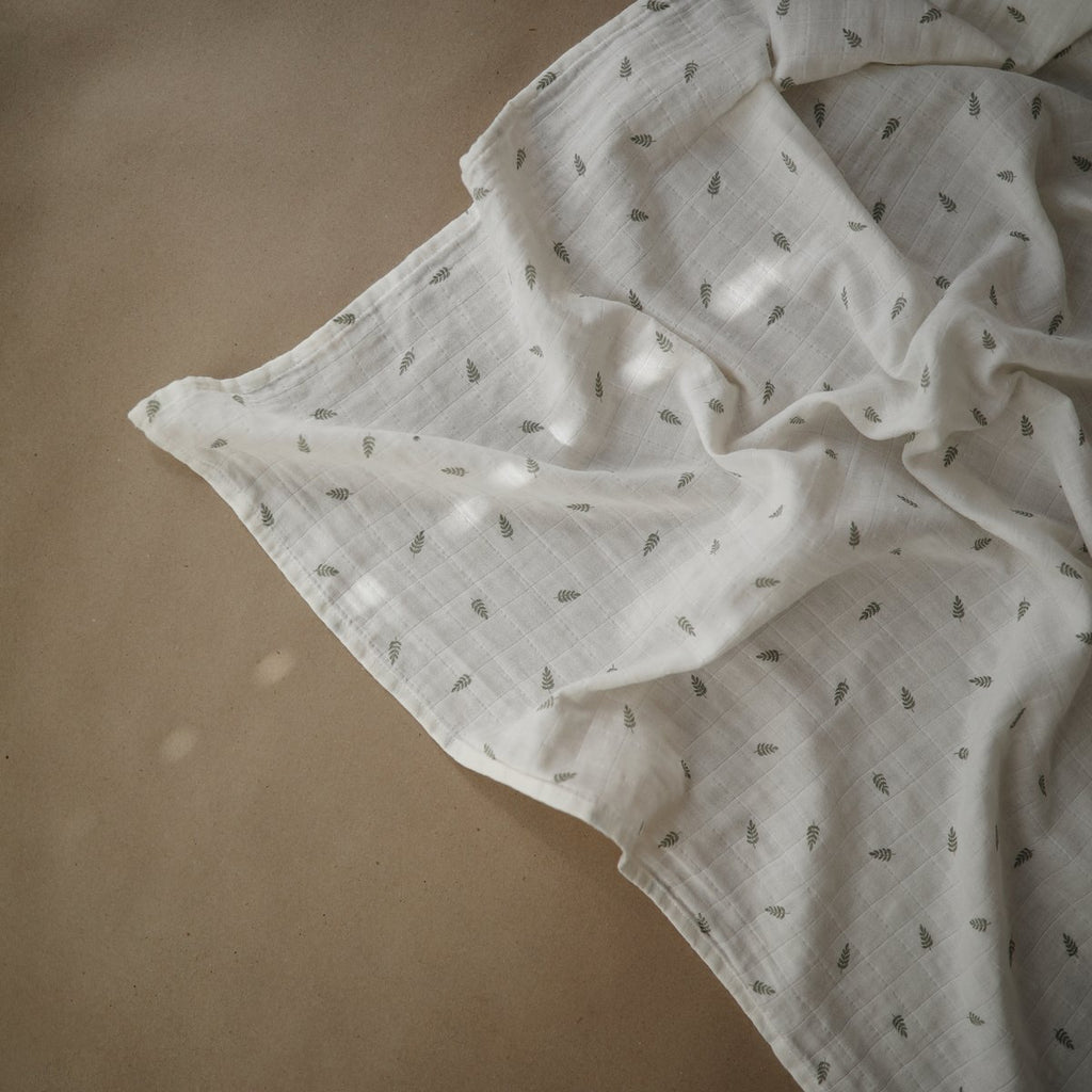 Muslin Swaddle Blanket Organic Cotton (Leaves) | Mushie - Baby Swaddles + Bedding