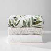 Babyletto | Crib Sheet in GOTS Certified Organic Muslin Cotton | Olive Branches
